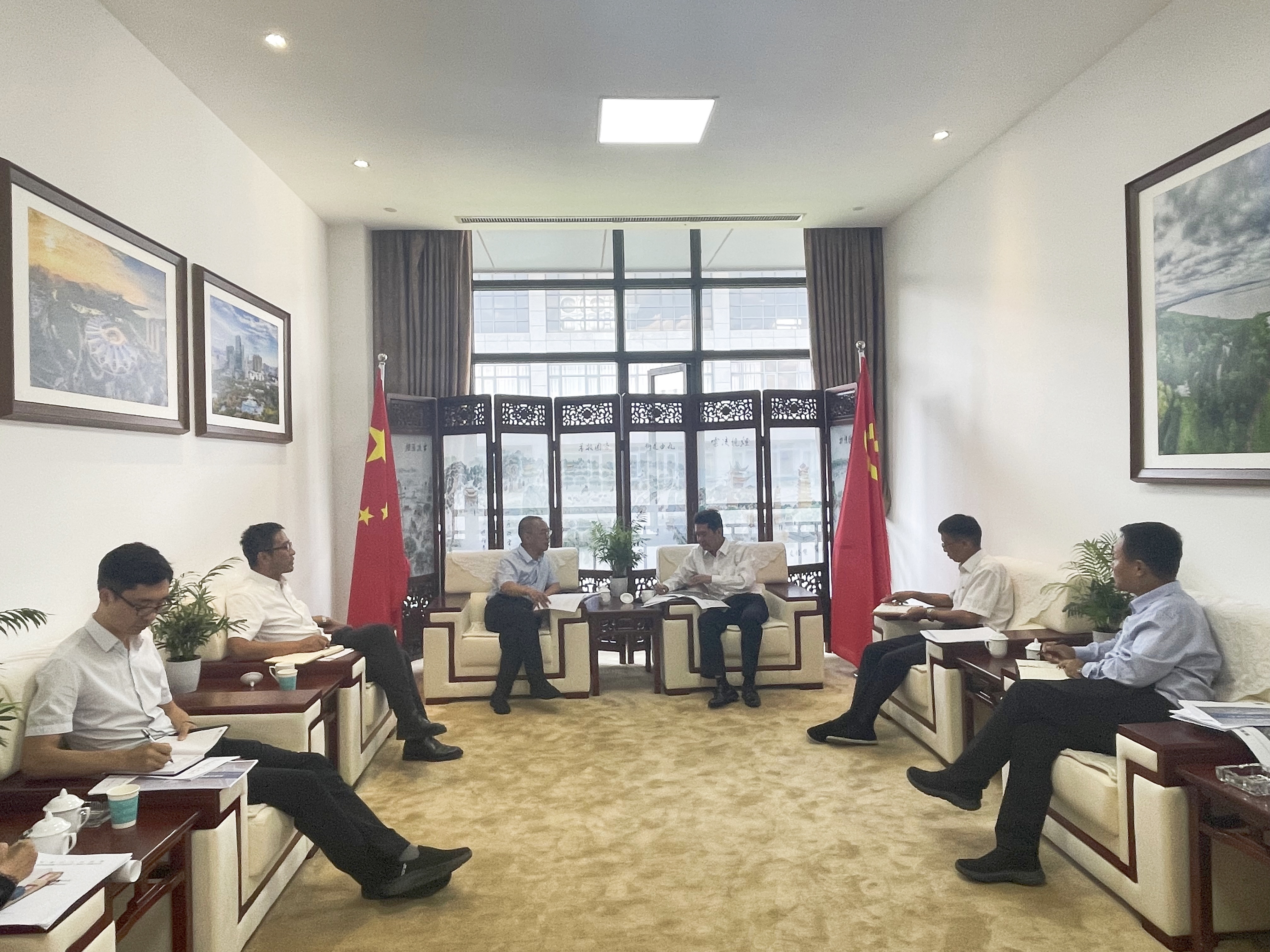 公司與官渡區(qū)政府交流座談